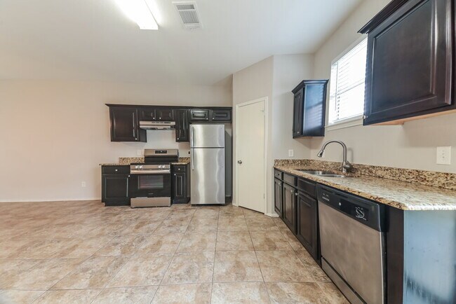 Building Photo - 9727 Checota Dr