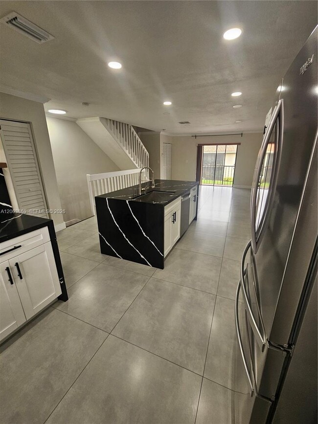 Building Photo - 9846 Hammocks Blvd