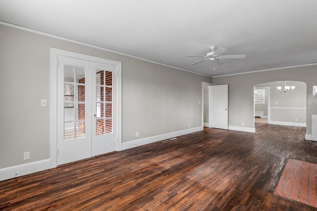 Building Photo - SW, Large Brick Two Bedroom PLUS Two Sun-Rooms, Hardwoods, LR & Separate DR, Fire Place!