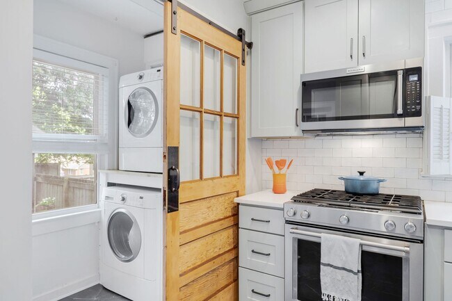 Building Photo - Class Brick Cottage with Modern Comforts in Historic Overbrook