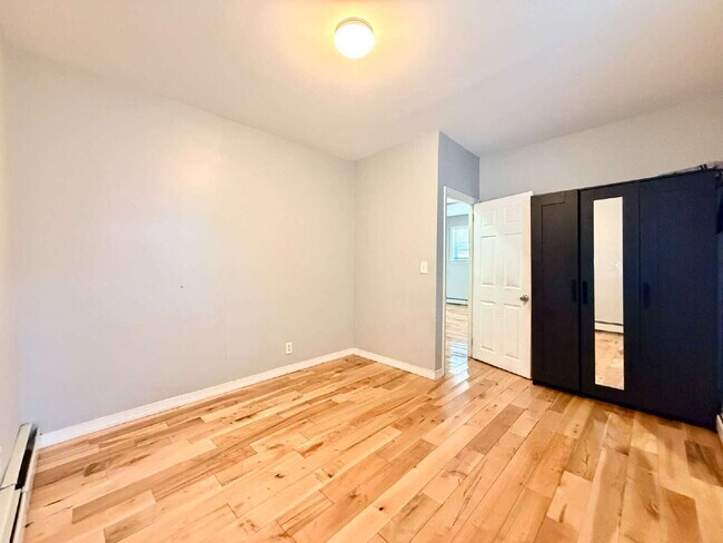 Building Photo - Move in July 1st • Spacious 1BR w/ Bonus Room Open Layout • Assigned Parking • Appliances • Garfield