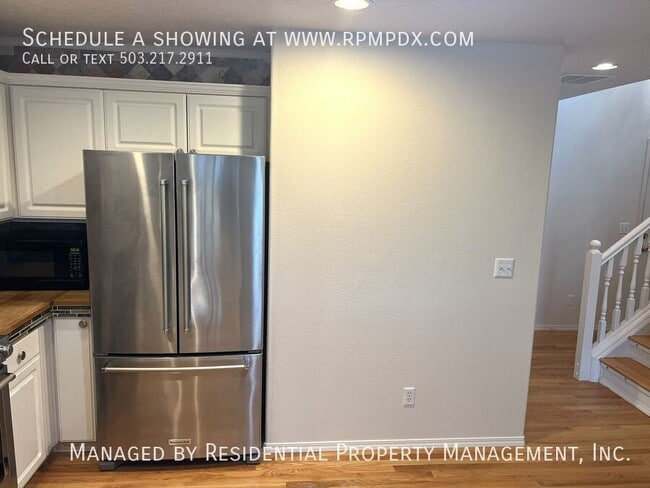 Building Photo - 6463 NW Wenmarie Dr