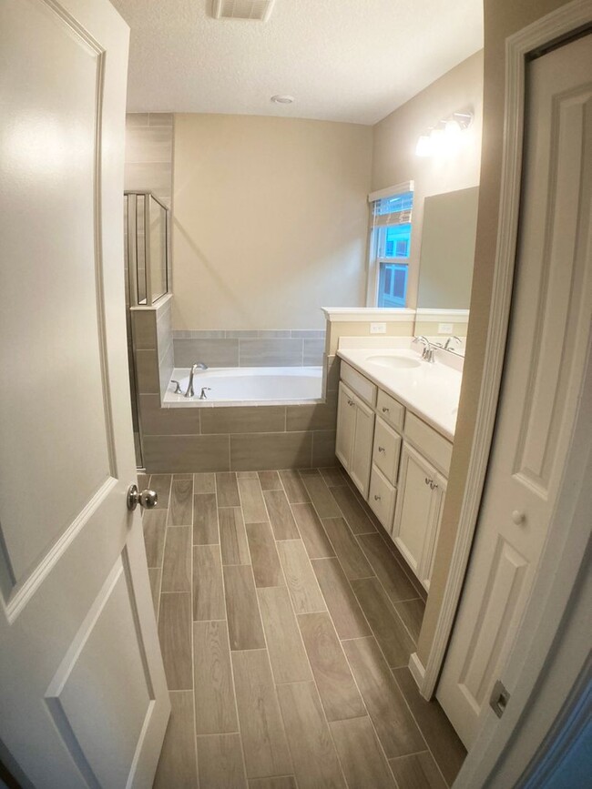 Building Photo - Your Private Escape with High-End Finishes...