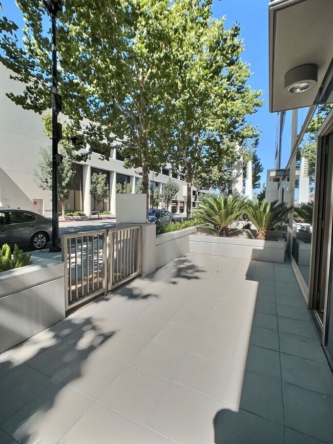 Building Photo - Luxury 1 Bedroom Condo at Axis – with Outdoor Patio Space!