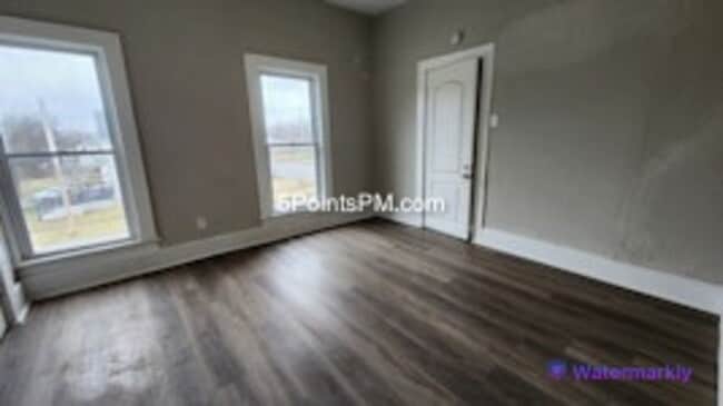 Building Photo - 9804 Miles Ave