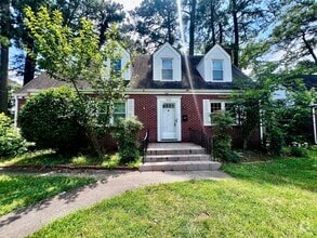 Building Photo - Charming Brick Cape Cope
