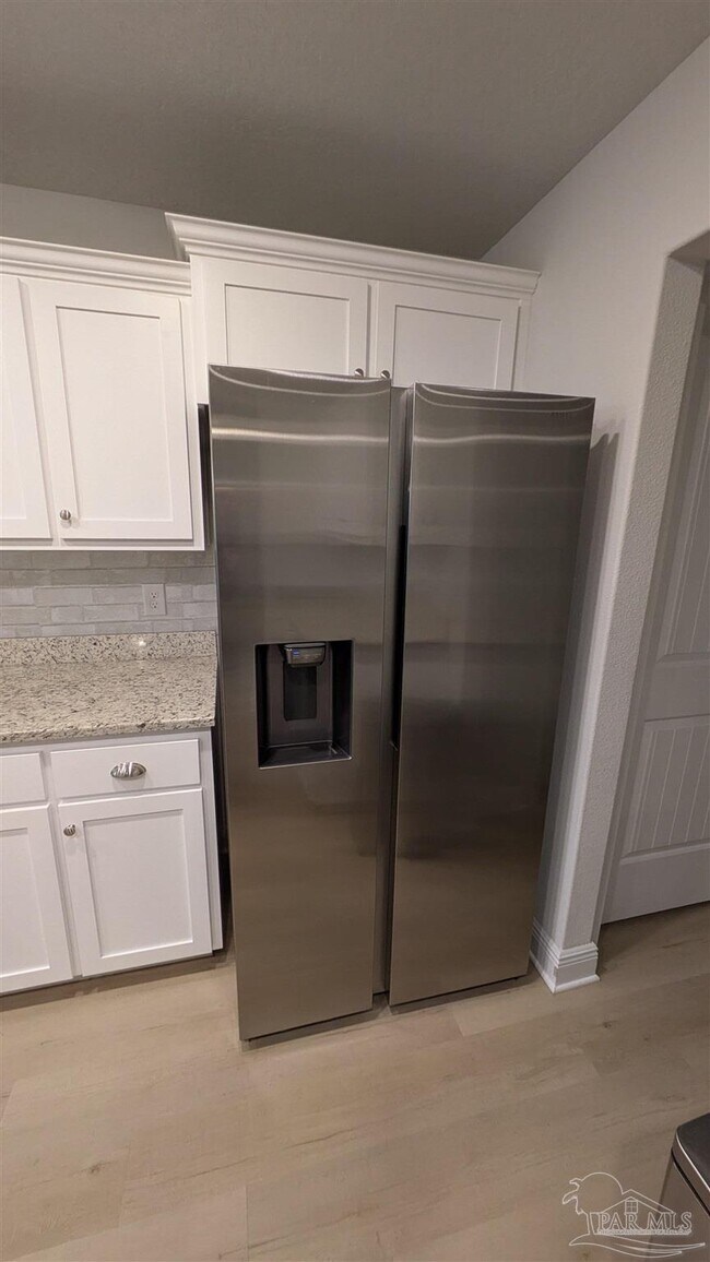 Building Photo - 5693 Old Stone Blvd