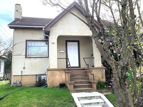 Building Photo - Eliot neighborhood House: 2 bedroom, large basement, hardwood floors, laundry units & fireplace