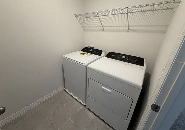 Building Photo - "Spacious 3-Bedroom Townhouse with Granite Elegance in St. Cloud – 4543 Rangeland Way"