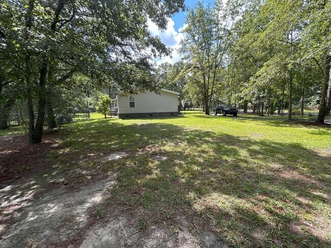 Building Photo - Immaculate 4BR Mobile Home in the heart of...
