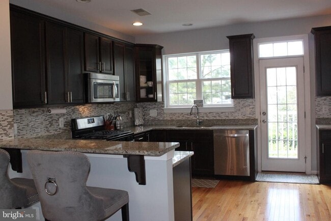 Building Photo - 7452 Riding Meadow Way