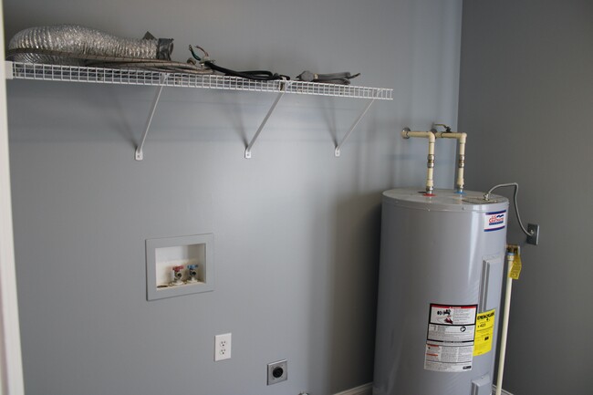 Laundry room with washer/dryer hook ups - 309 S Jefferson St