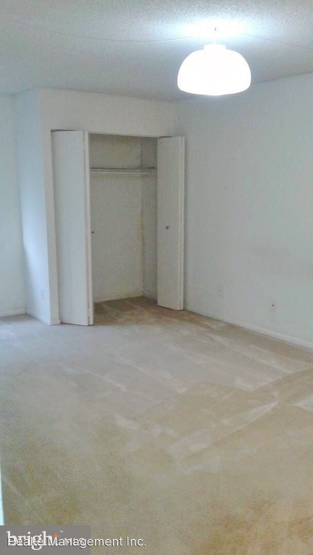 Building Photo - 2 br, 1.5 bath House - 11806 Breton Ct. #12C