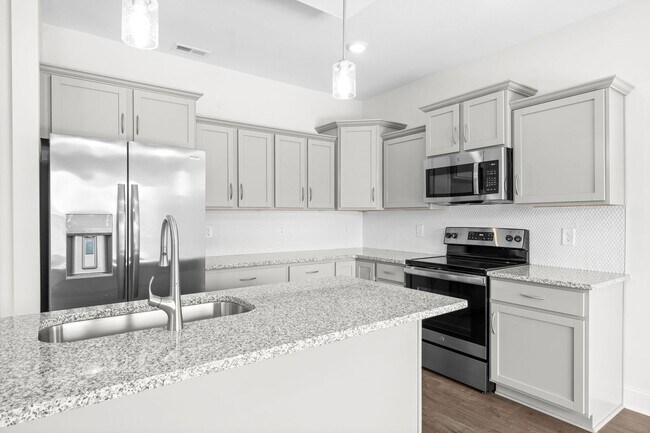 Building Photo - Pet Friendly Three Bedroom with Bonus!