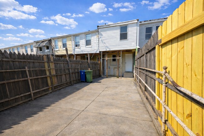 Building Photo - Charming Baltimore Rowhome with Private Backyard & Modern Updates