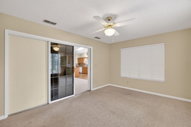 Building Photo - Available Now in Scottish Highlands | 2BR/2BA + Den in Active 55+ Community