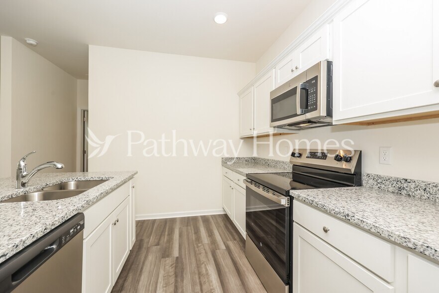 Building Photo - 209 Wild Daisy Wy