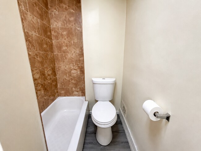 Building Photo - Charming Baltimore Rowhome with Updated Kitchen, Covered Front Porch & Basement