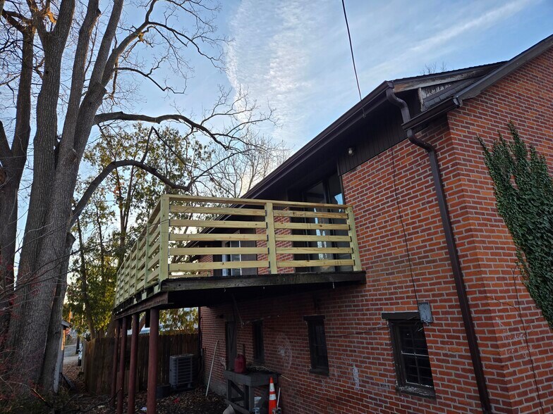 Large private deck perfect for outdoor seating. - 60 W Winter St