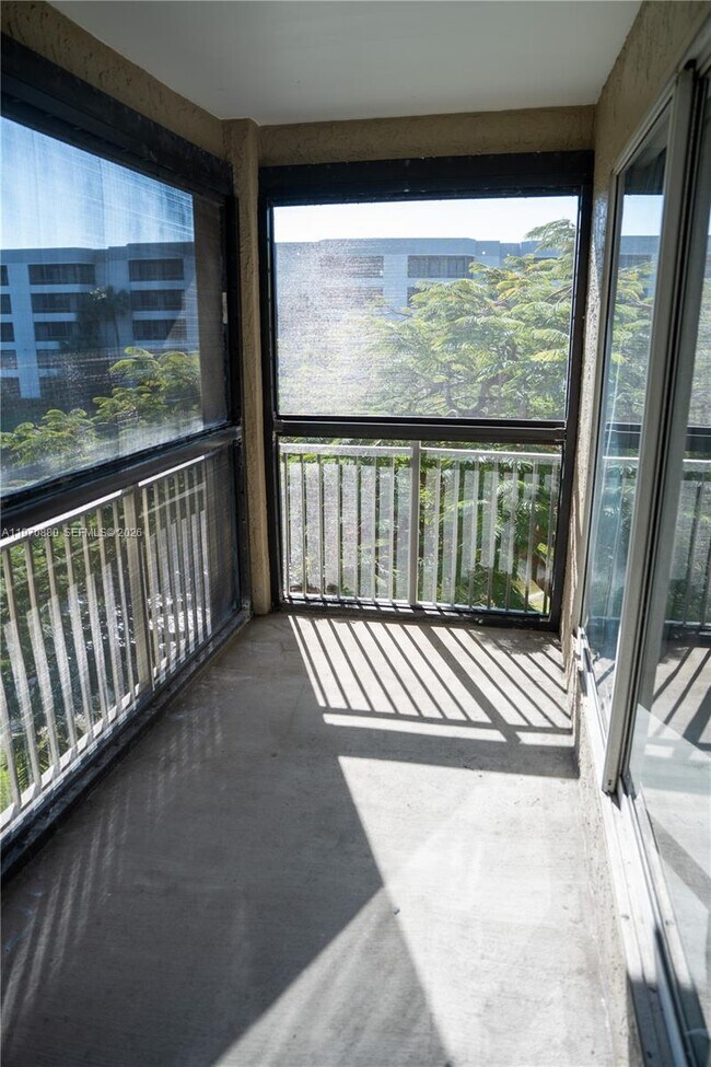 Building Photo - 1865 Palm Cove Blvd