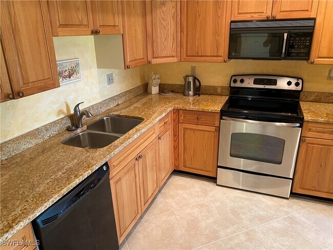 Building Photo - 6760 Pelican Bay Blvd