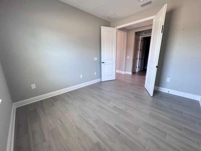 Building Photo - New Construction in Grand Park-4 Bedrooms and 4 Bathrooms with a Den and a Loft! No deposit for q...