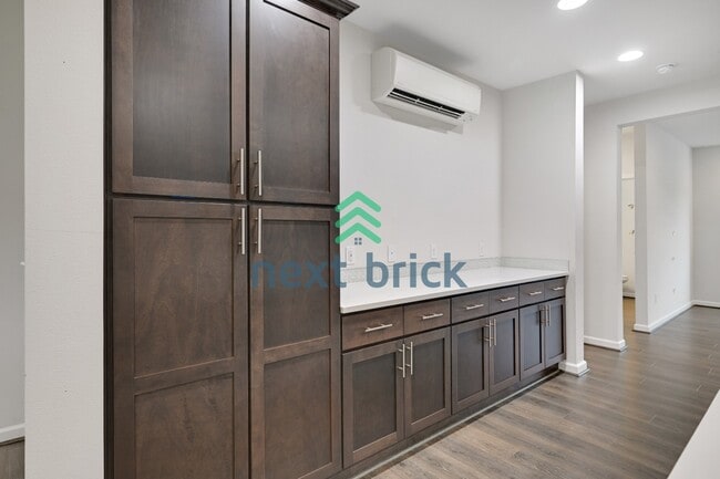 Building Photo - A Beautiful Corner Home Designed for Comfort, Light & Community!