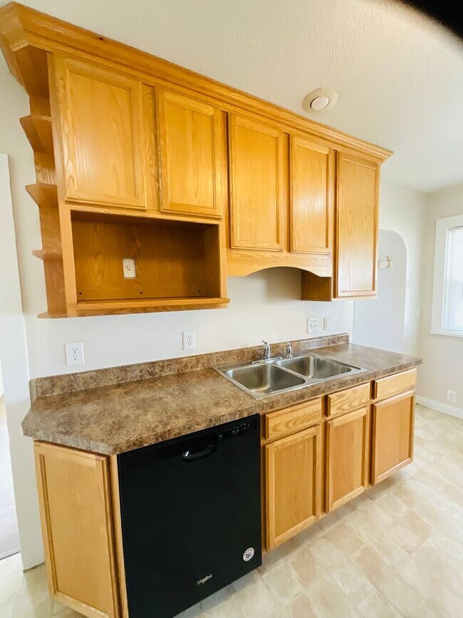 Building Photo - charming 2-bedroom home tucked within the heart of Colorado Springs, CO, and filled with an abund...