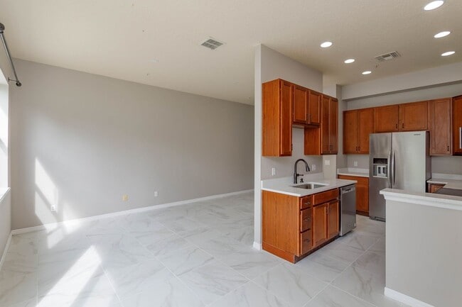 Building Photo - Spacious 4-Bedroom, 2.5-Bathroom Townhome with Modern Finishes and Community Amenities!