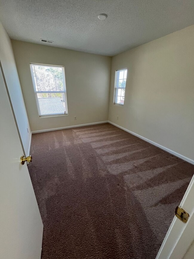 Building Photo - Nice two story 3 BR house with one car garage off Mineral Springs Road, Durham NC. Close to Highw...