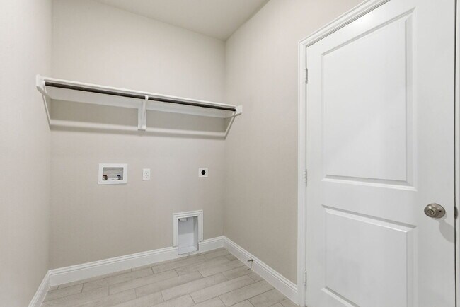 Building Photo - "Open-Concept 4-Bedroom, 2.5-Bath with Designer Finishes and Peaceful Greenbelt Views!"