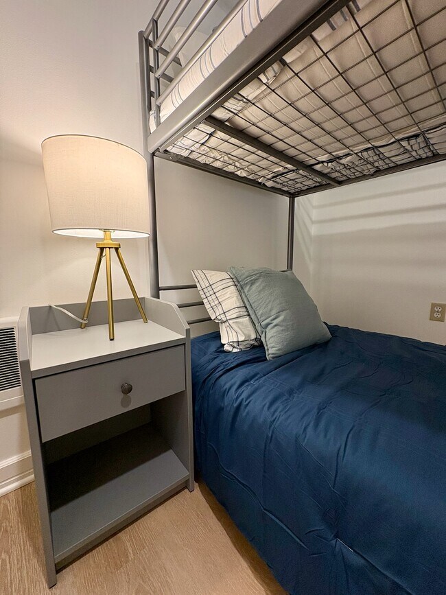 Second bedroom with all new linens, blankets and pillows - 21204 3rd Ave S