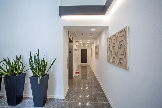 Building Photo - One of a Kind Furnished Condo in the Heart...