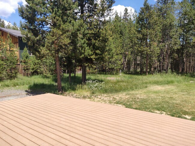 Building Photo - Charming 4-Bedroom Home on 1/2 Acre with a Fenced Backyard, Fully Insulated Double-Car Garage, in...