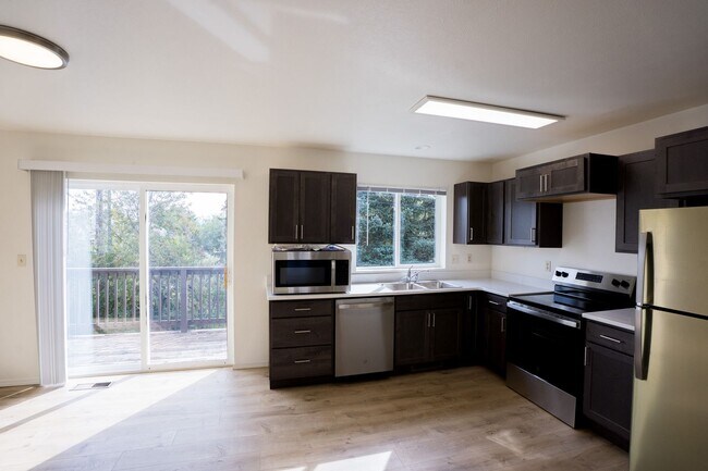 Building Photo - FULLY GUTTED & RENOVATED 4-Bedroom Condo Near Montana State University