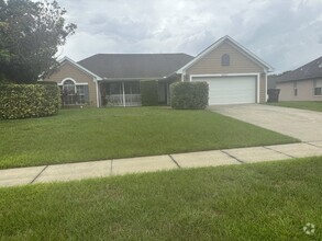 Building Photo - Beautiful 3 Bedroom 2 Bath Pool Home Lawn ...