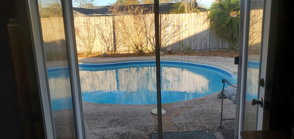 Master bedroom french doors to pool - 2620 Moody Ave