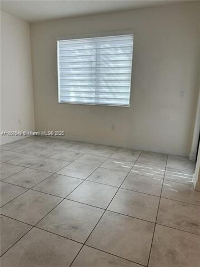 Building Photo - 4670 NW 84th Ave