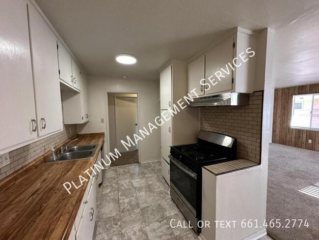 Building Photo - 1839 E Ave Q10