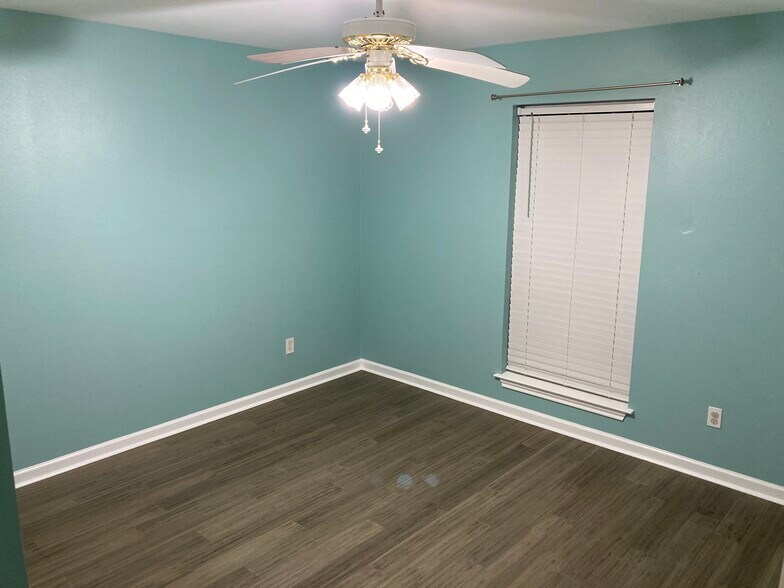 Bedrooms have hardwood floors. - 16485 County Road 164