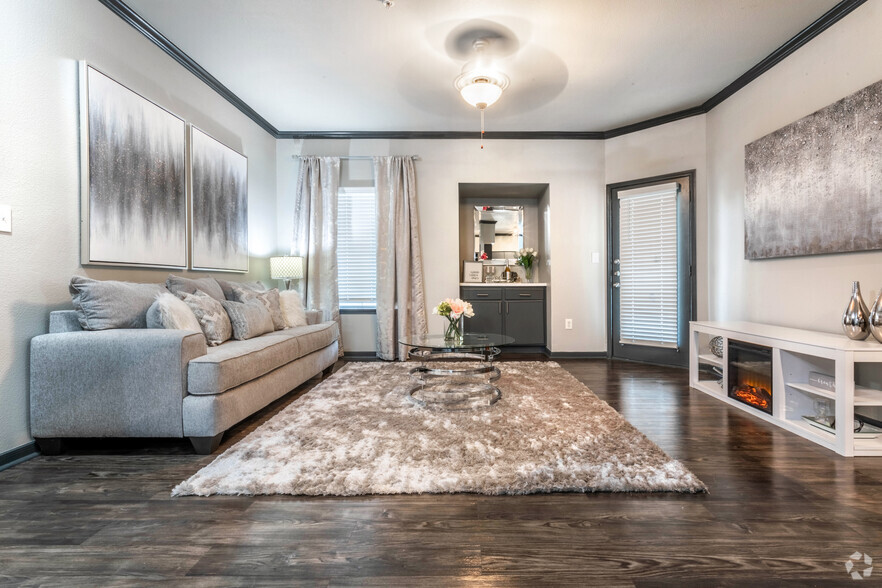 Living Room with Built-In Wet Bar - Trails At Eldridge Parkway