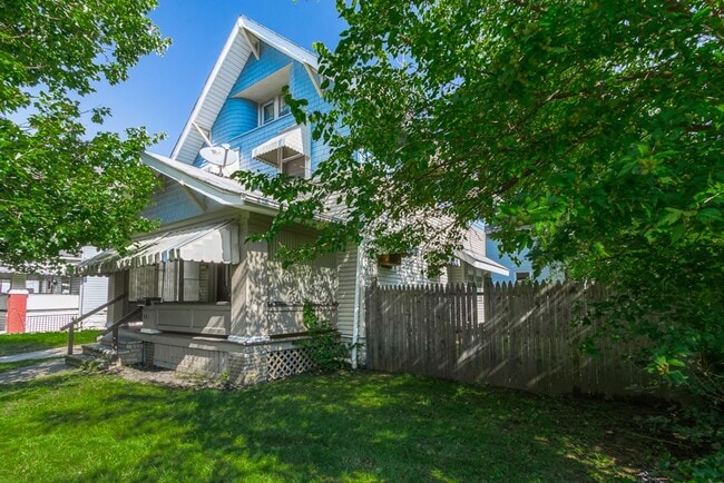 Building Photo - Charming 3BR Home with Classic Woodwork, Porch & Bonus Attic Space