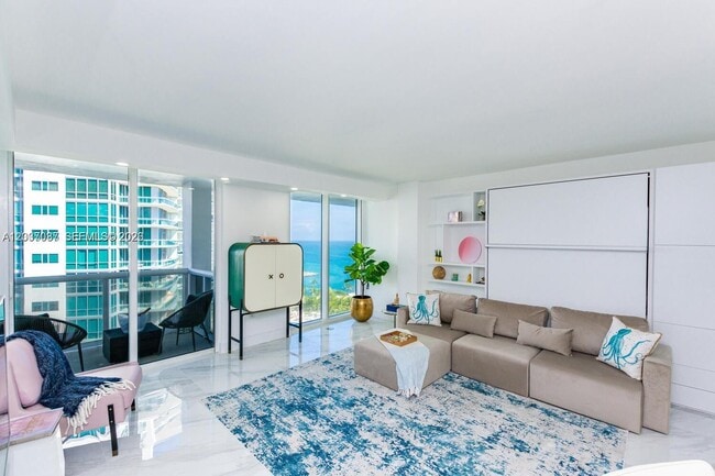 Building Photo - 10275 Collins Ave