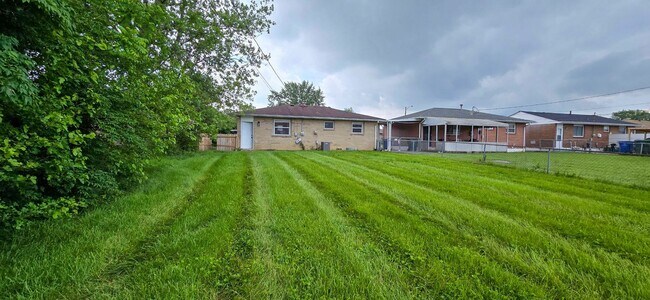 Building Photo - Stylishly Renovated 3-Bedroom Home with Finished Basement & Spacious Fenced Yard