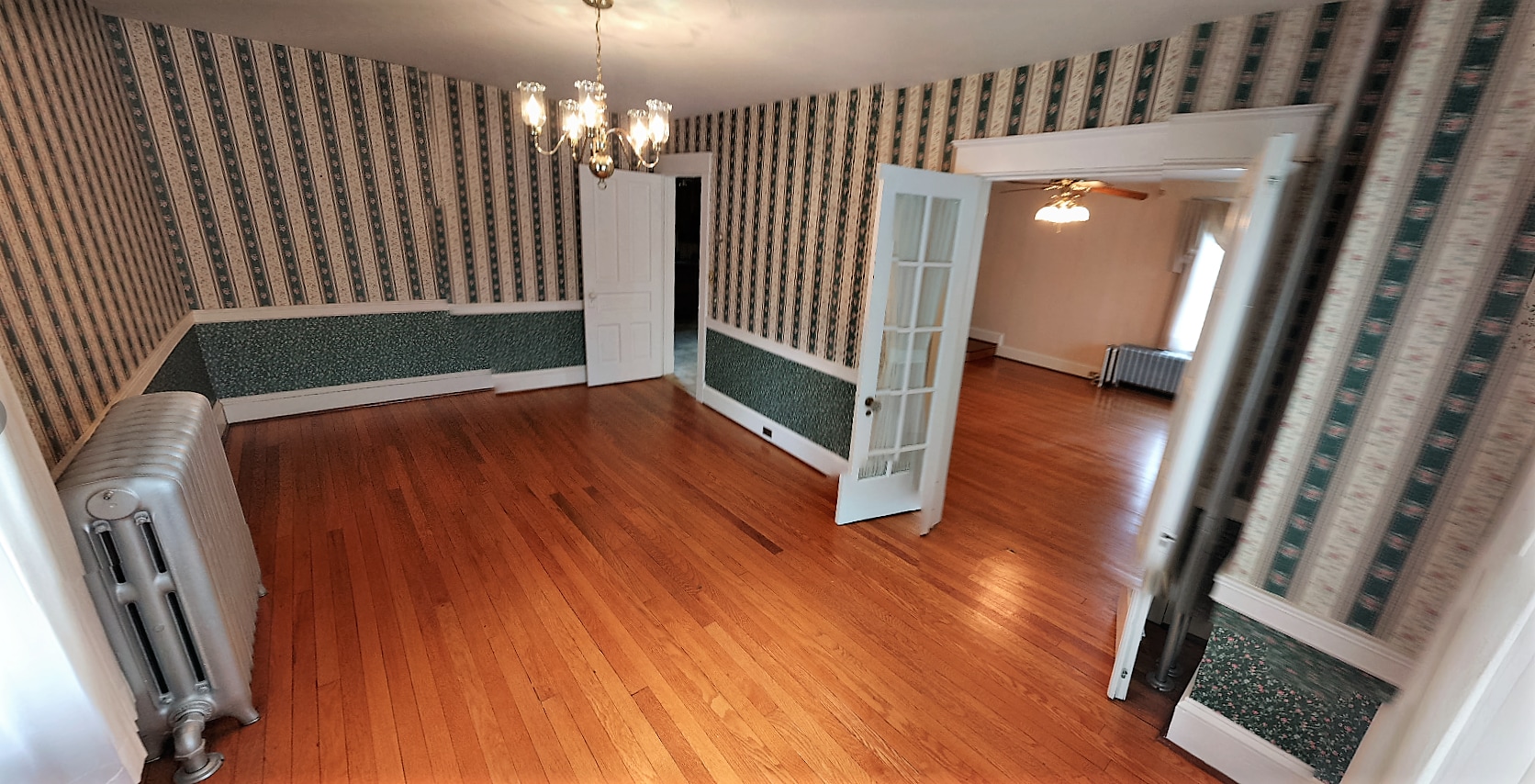 Dining room. NOTE: all pictures were taken before the interior was repainted - none of the old wall paper remains. - 925 North Market Street