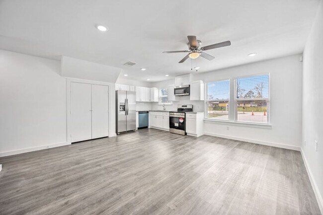 Building Photo - Brand New! Stunning 2-Story Unit
