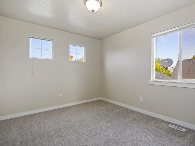 Building Photo - Spacious 4-Bedroom Home with 3-Car Garage