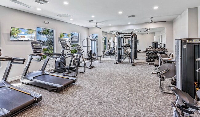Building Photo - Live the Southwest Florida lifestyle in this lakefront villa in South Naples!