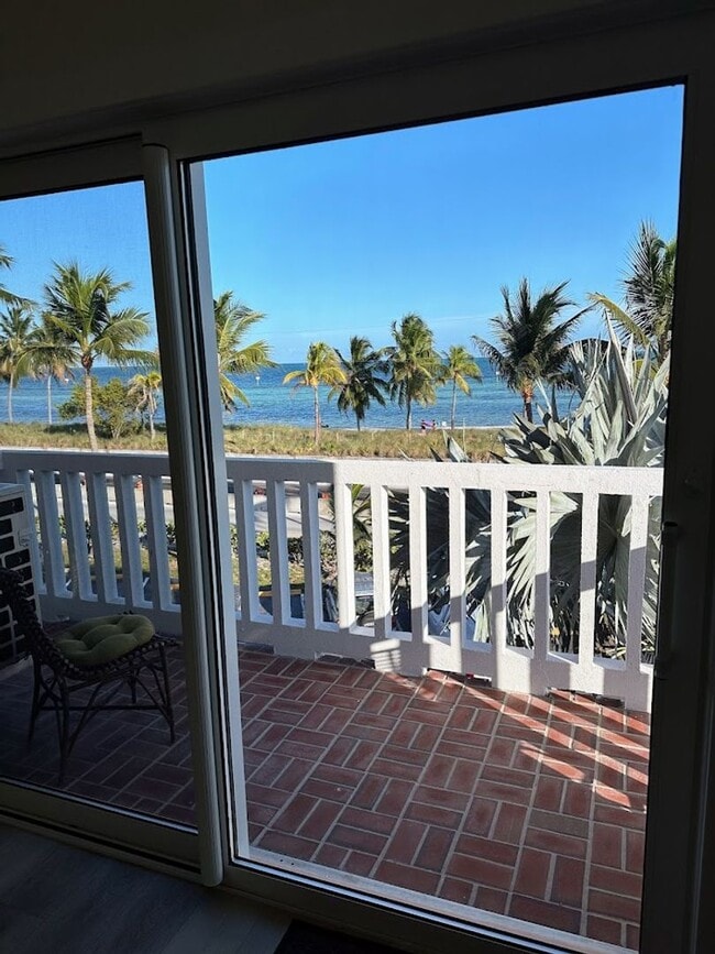 Building Photo - Oceanfront 2/1 furnished Condo