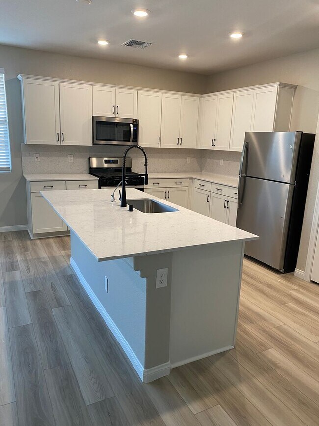 Building Photo - Americana Property Mgmt - 2022 built 4 bedrooms in prime South West Las Vegas